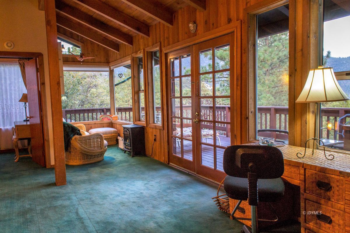 25120 Foster Lake Road Idyllwild, CA 92549 - Photo 27 of 31 a room with furniture and a window