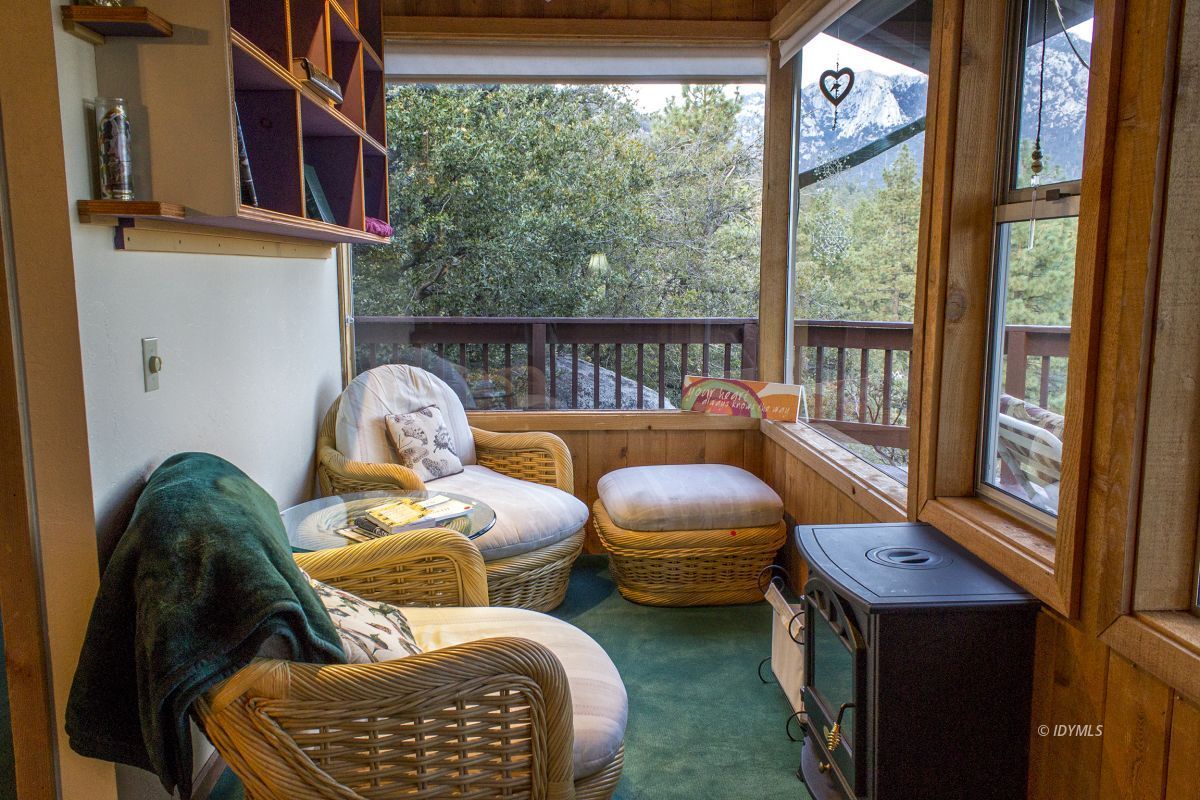 25120 Foster Lake Road Idyllwild, CA 92549 - Photo 28 of 31 a bedroom with furniture and a window