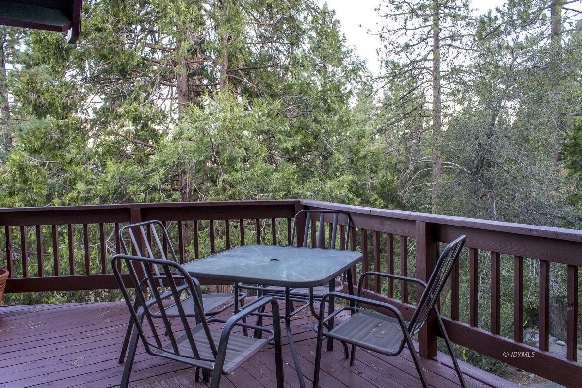 25120 Foster Lake Road Idyllwild, CA 92549 - Photo 29 of 31 a view of a wooden bench on the roof deck