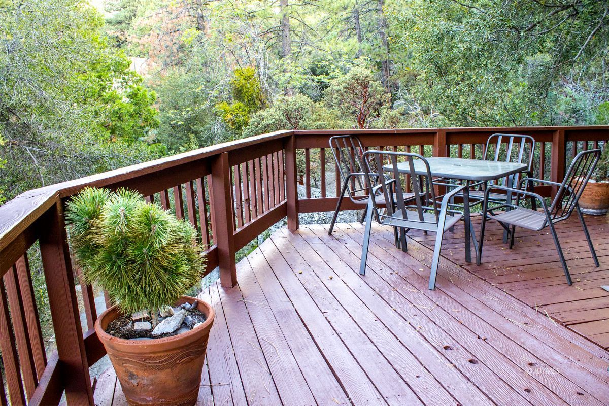 25120 Foster Lake Road Idyllwild, CA 92549 - Photo 30 of 31 a view of balcony with furniture and wooden floor