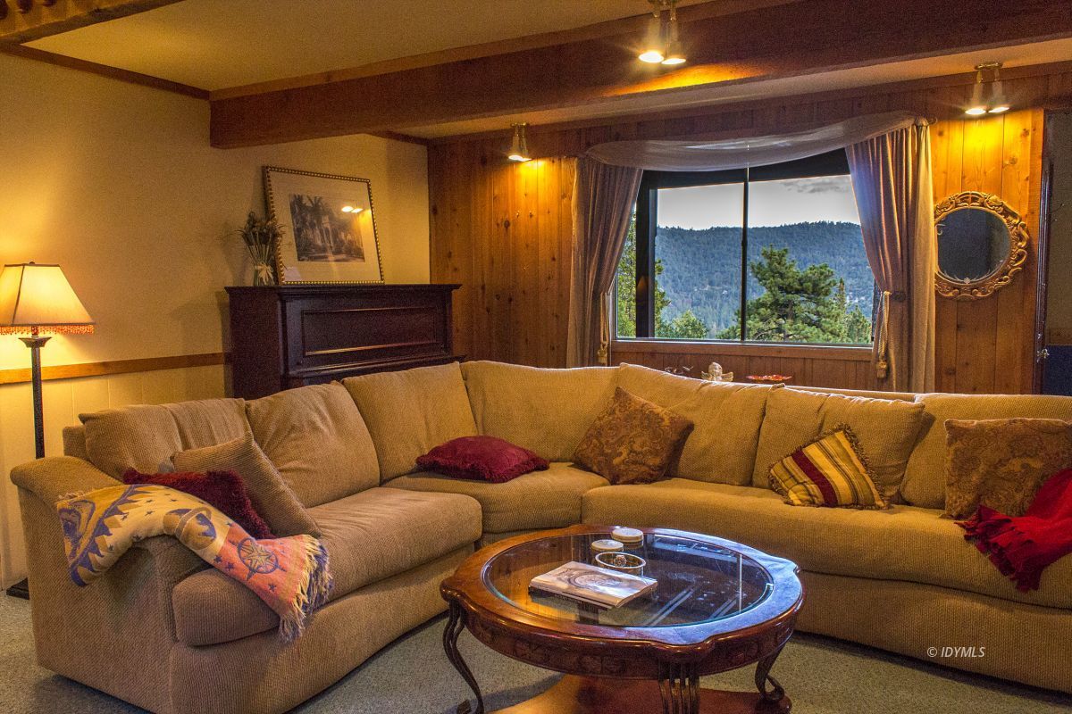 25120 Foster Lake Road Idyllwild, CA 92549 - Photo 5 of 31 a living room with furniture and a large window