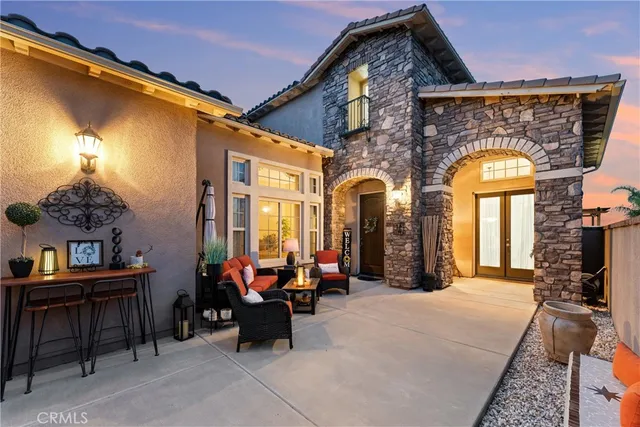 a kitchen with stainless steel appliances granite countertop a sink and a stove