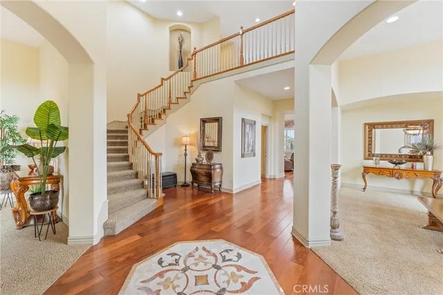 a kitchen with granite countertop a sink and a stove top oven