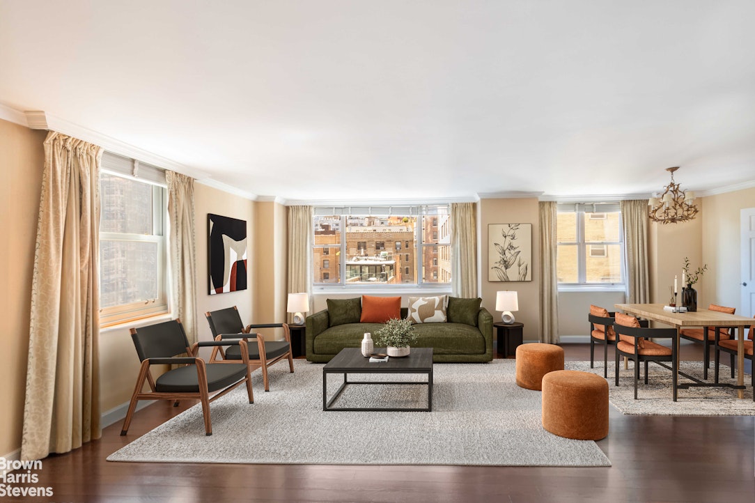 137 East 36th Street, Unit 7K Manhattan, NY 10016 - Photo 1 of 30 a living room with furniture and floor to ceiling windows