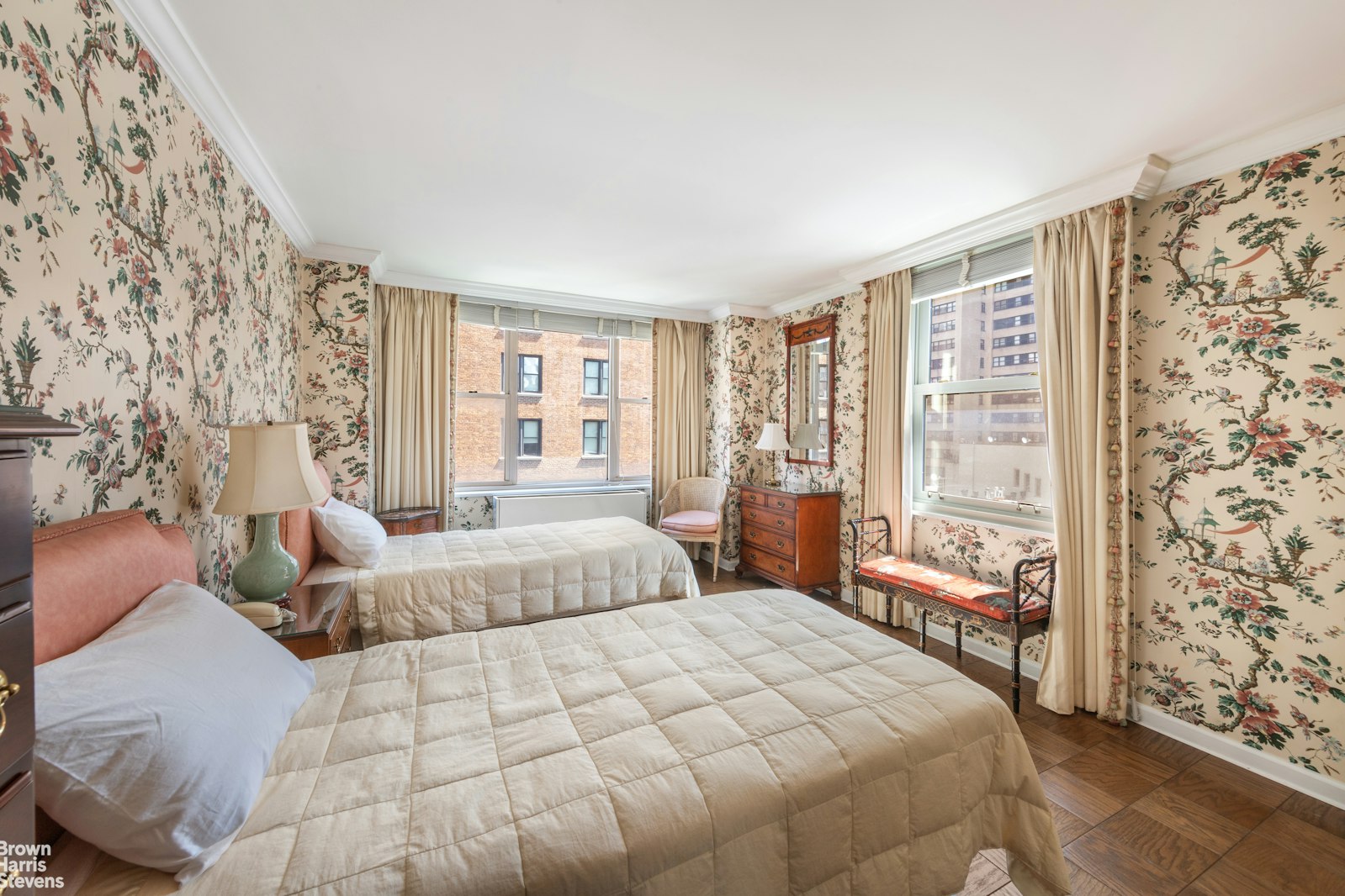 137 East 36th Street, Unit 7K Manhattan, NY 10016 - Photo 20 of 30 a bedroom with a large bed and a window