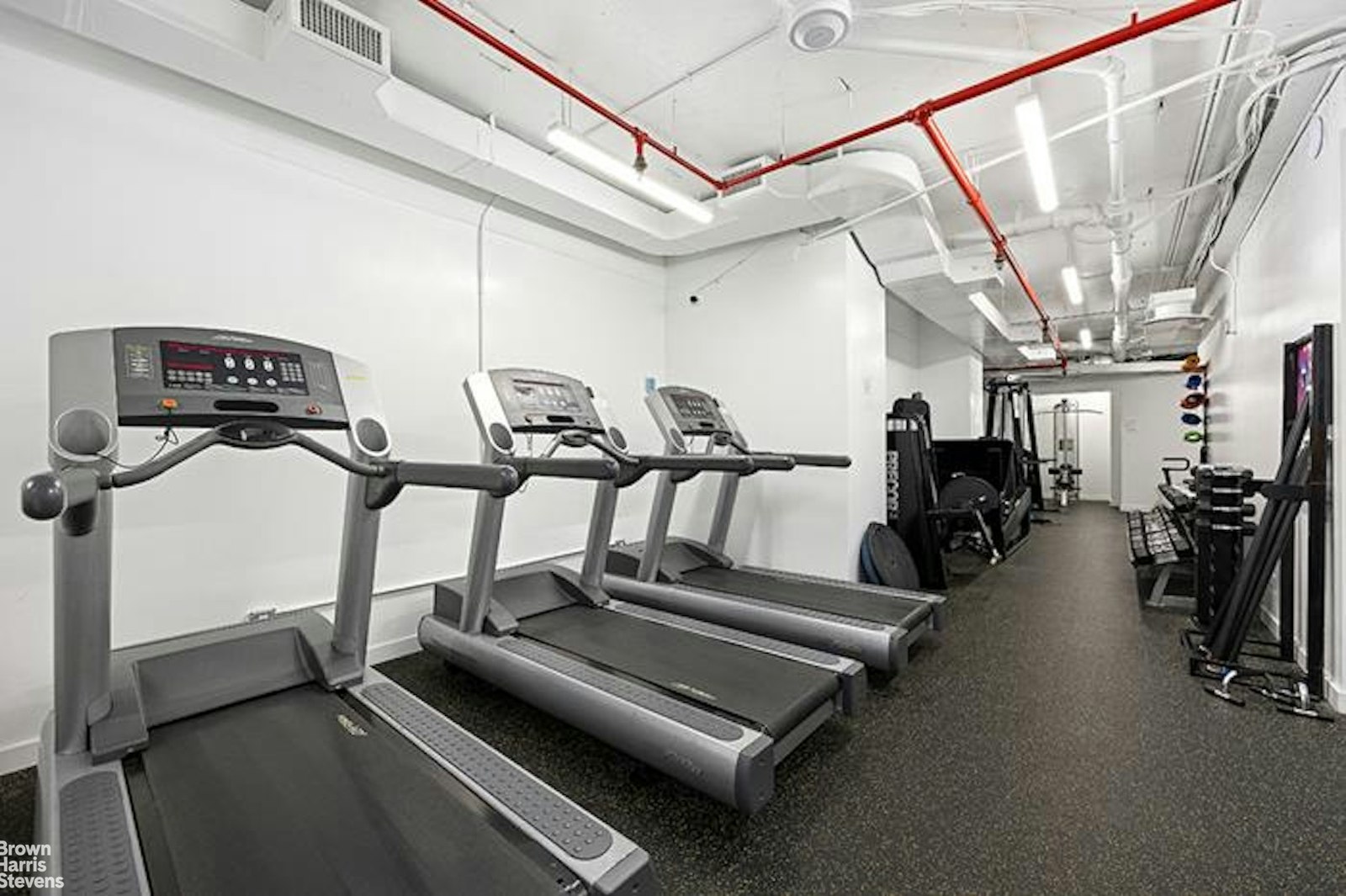 137 East 36th Street, Unit 7K Manhattan, NY 10016 - Photo 25 of 30 a view of a room with gym equipment