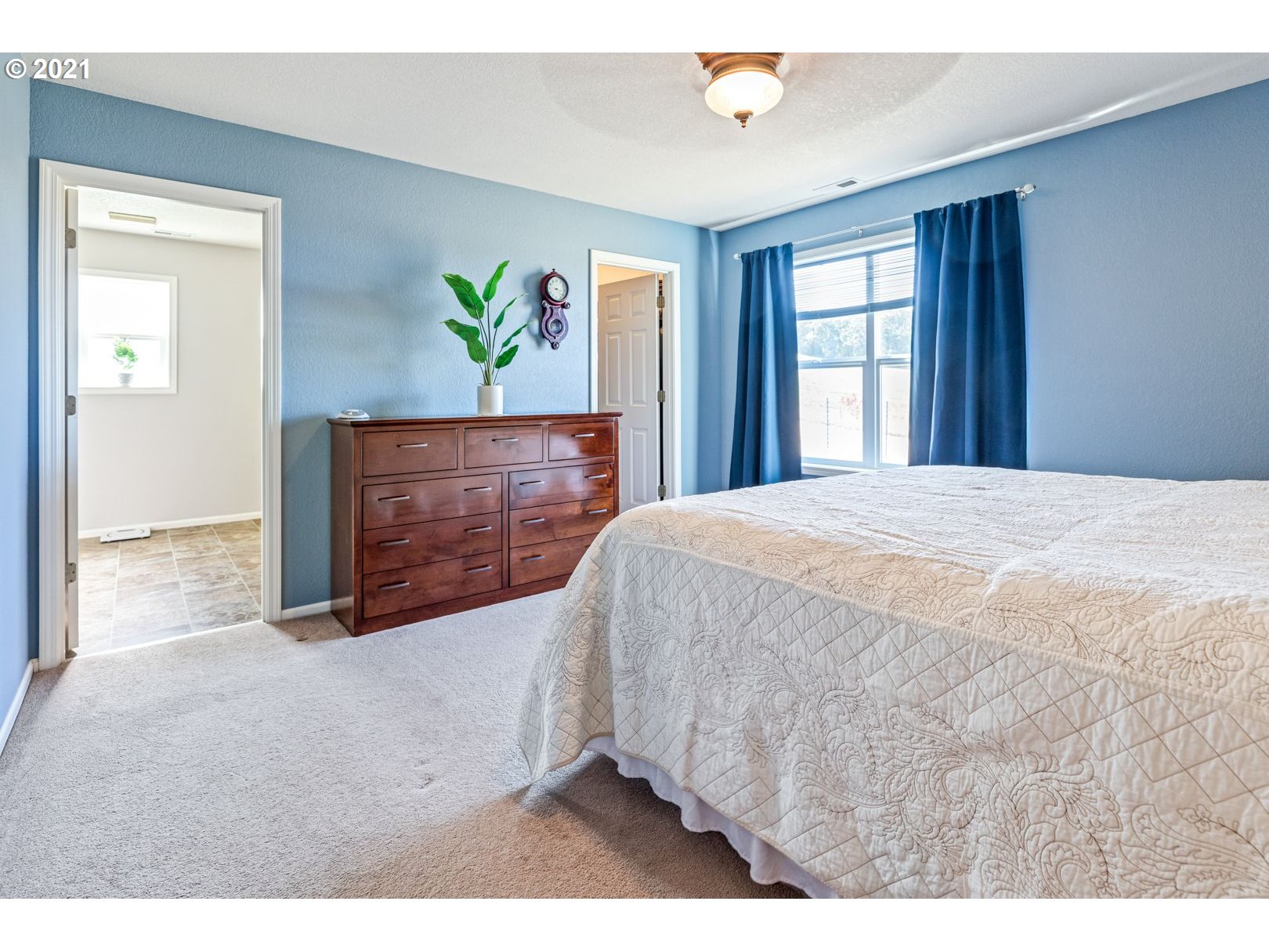 11820 Simpson Road Monmouth, OR 97361 - Photo 11 of 20 a bedroom with a bed and a window