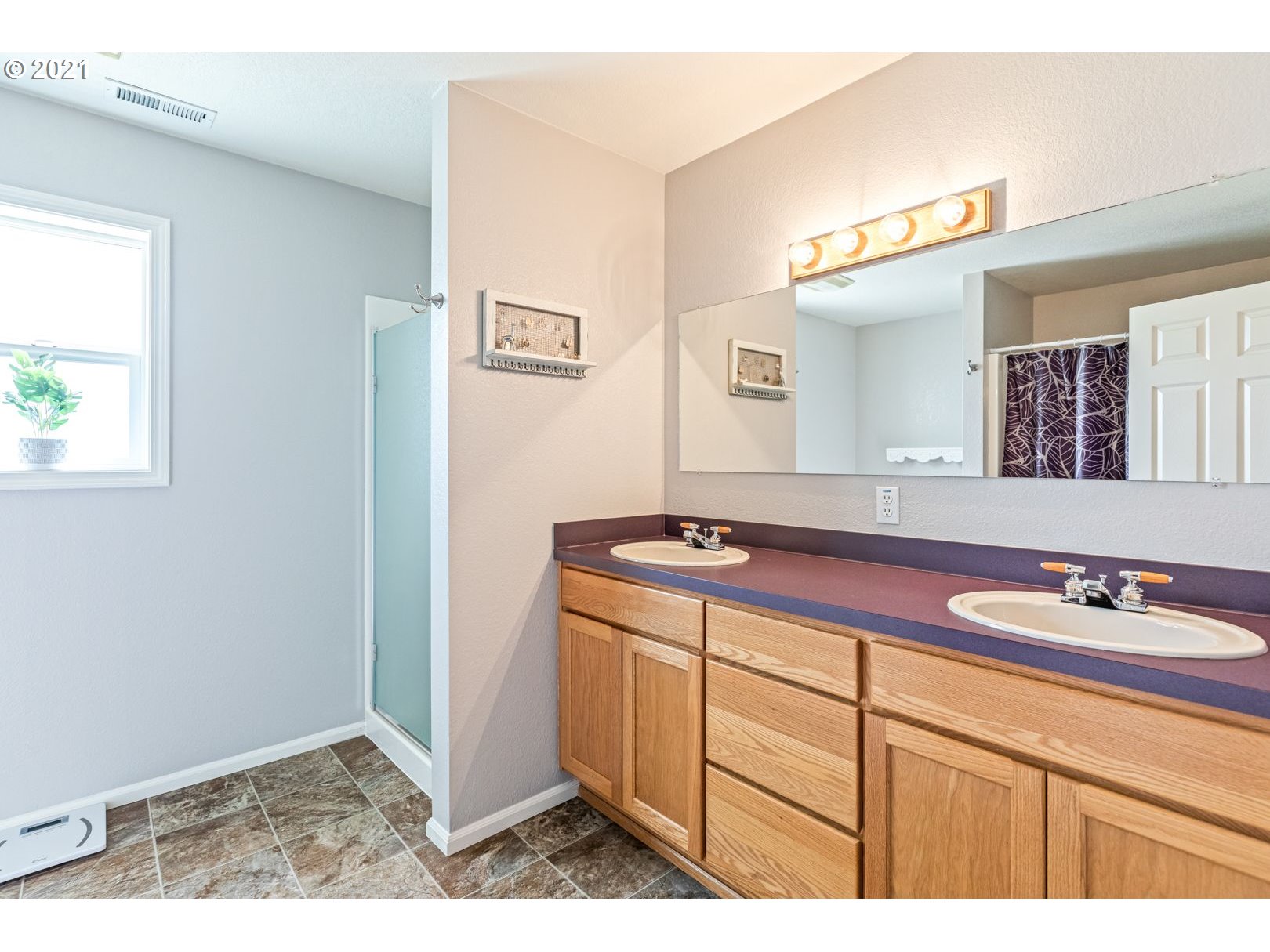 11820 Simpson Road Monmouth, OR 97361 - Photo 12 of 20 a bathroom with a sink and a mirror