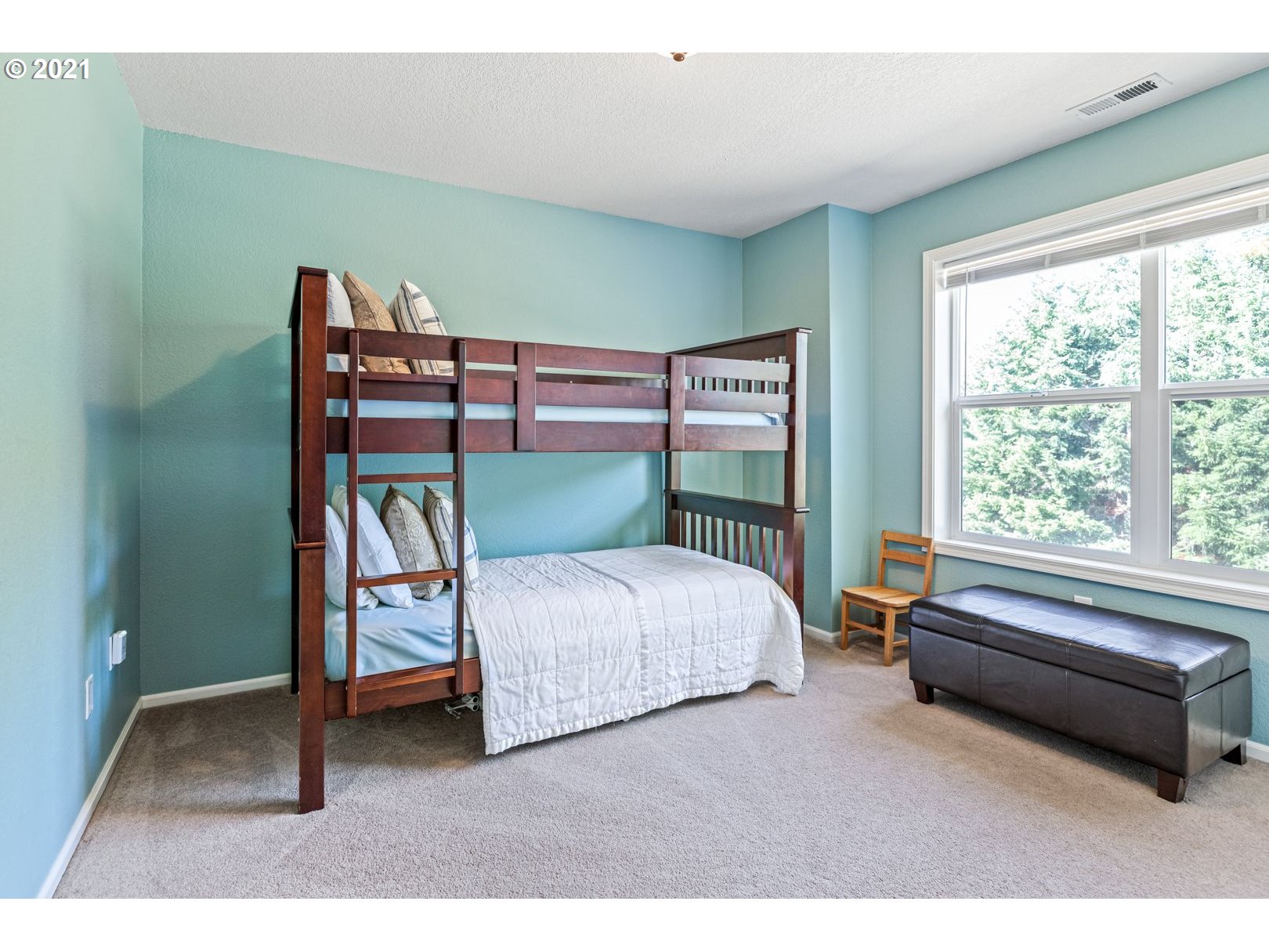 11820 Simpson Road Monmouth, OR 97361 - Photo 13 of 20 a bedroom with a bed chair and window