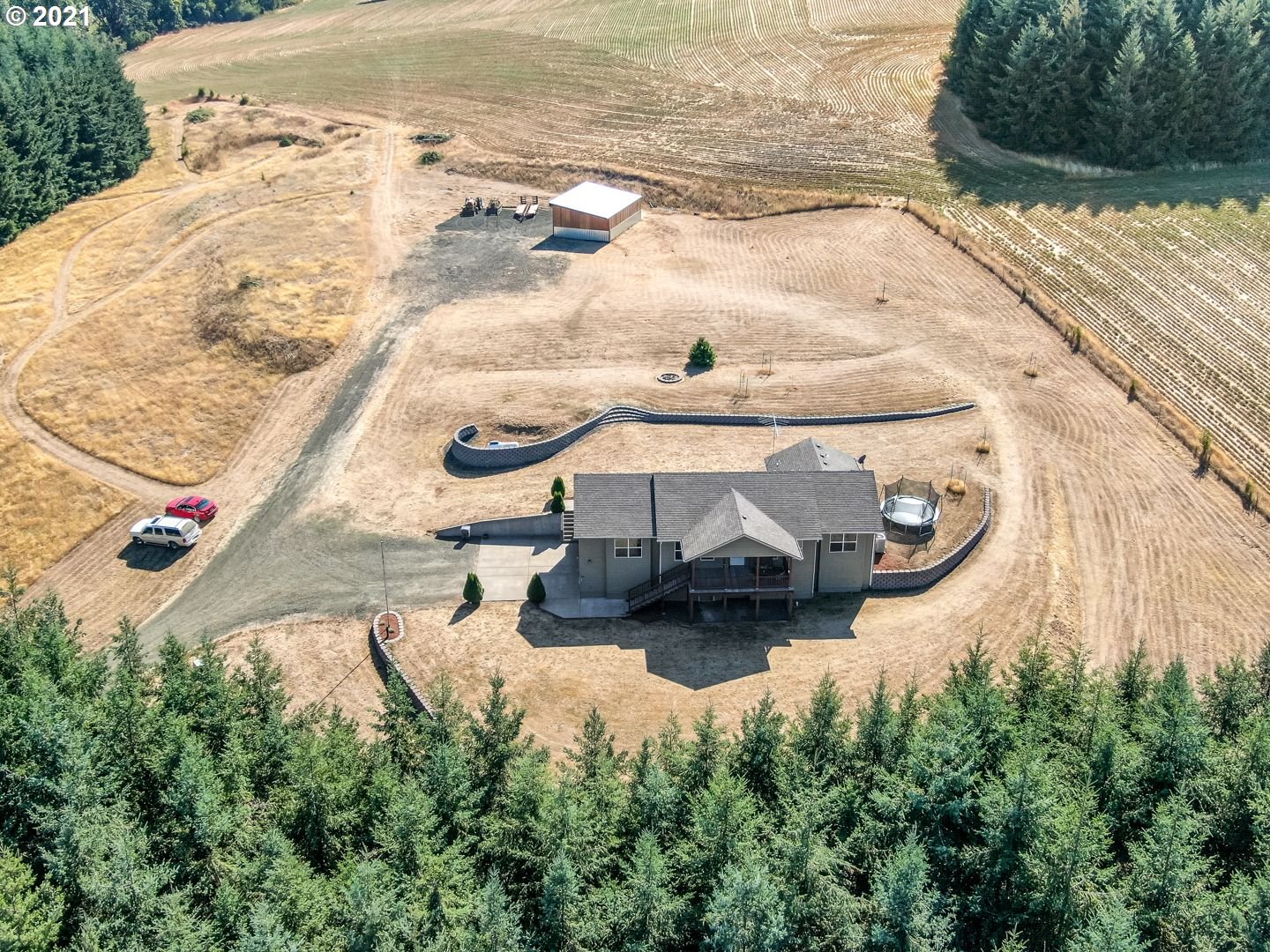 11820 Simpson Road Monmouth, OR 97361 - Photo 18 of 20 an aerial view of a house with a yard and lake view
