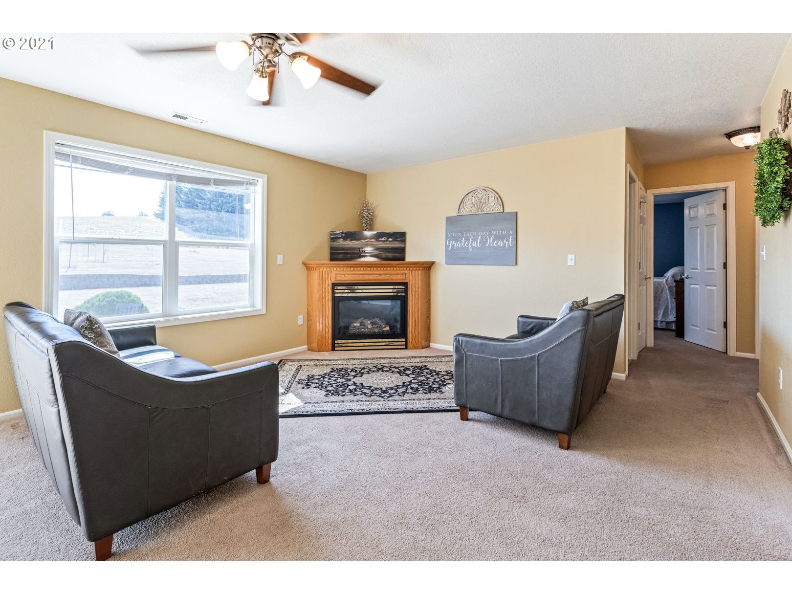 11820 Simpson Road Monmouth, OR 97361 - Photo 9 of 20 a living room with furniture and a fireplace
