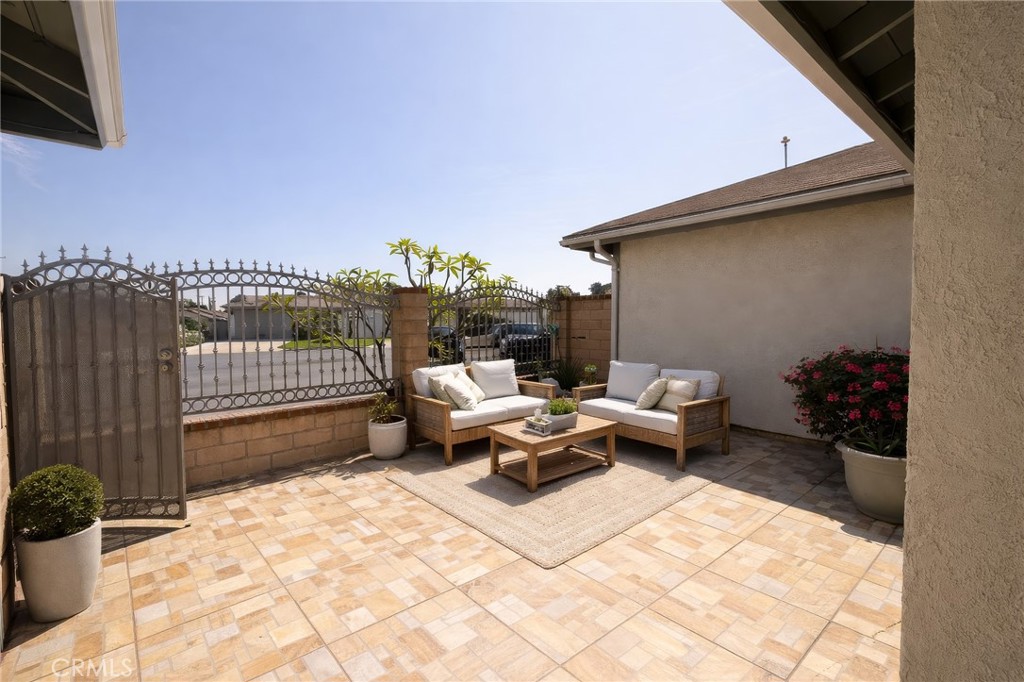 915 South Sarah Way Anaheim, CA 92805 - Photo 11 of 41 front patio virtually staged