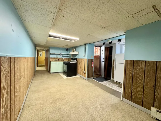 a view of a kitchen with a sink