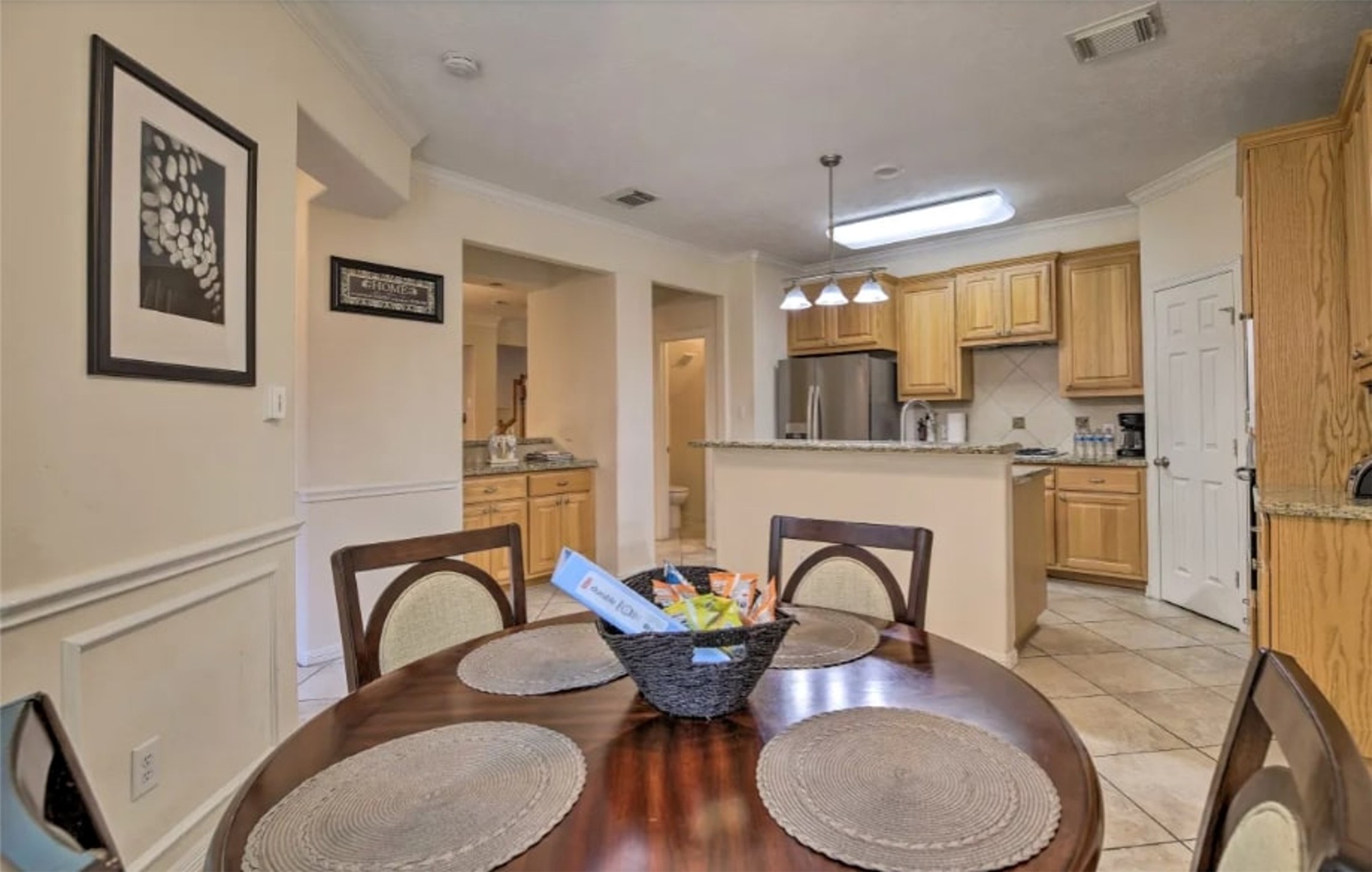 1006 Rochow Street, Unit A Houston, TX 77019 - Photo 12 of 29 a dining room with furniture window and wooden floor