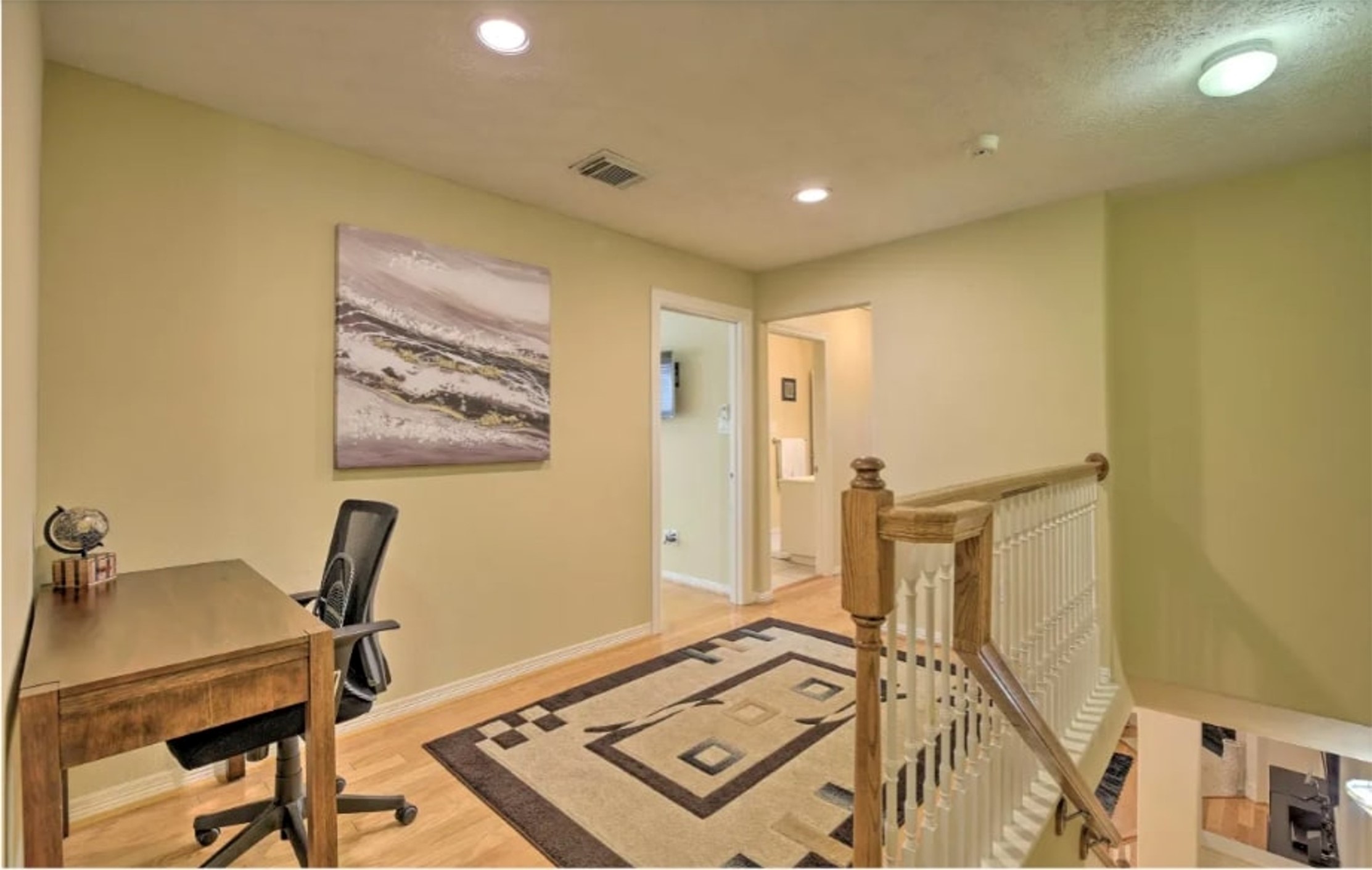 1006 Rochow Street, Unit A Houston, TX 77019 - Photo 19 of 29 a view of a workspace with furniture