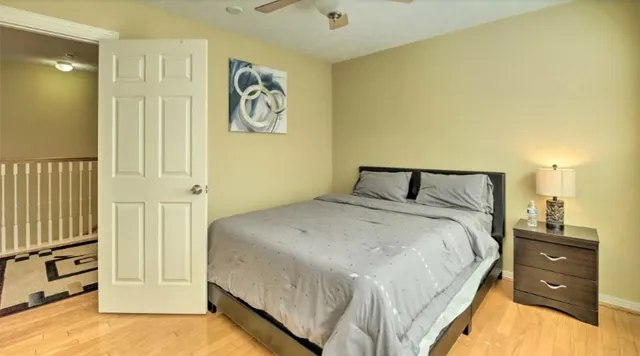 a bedroom with a bed and a cabinets