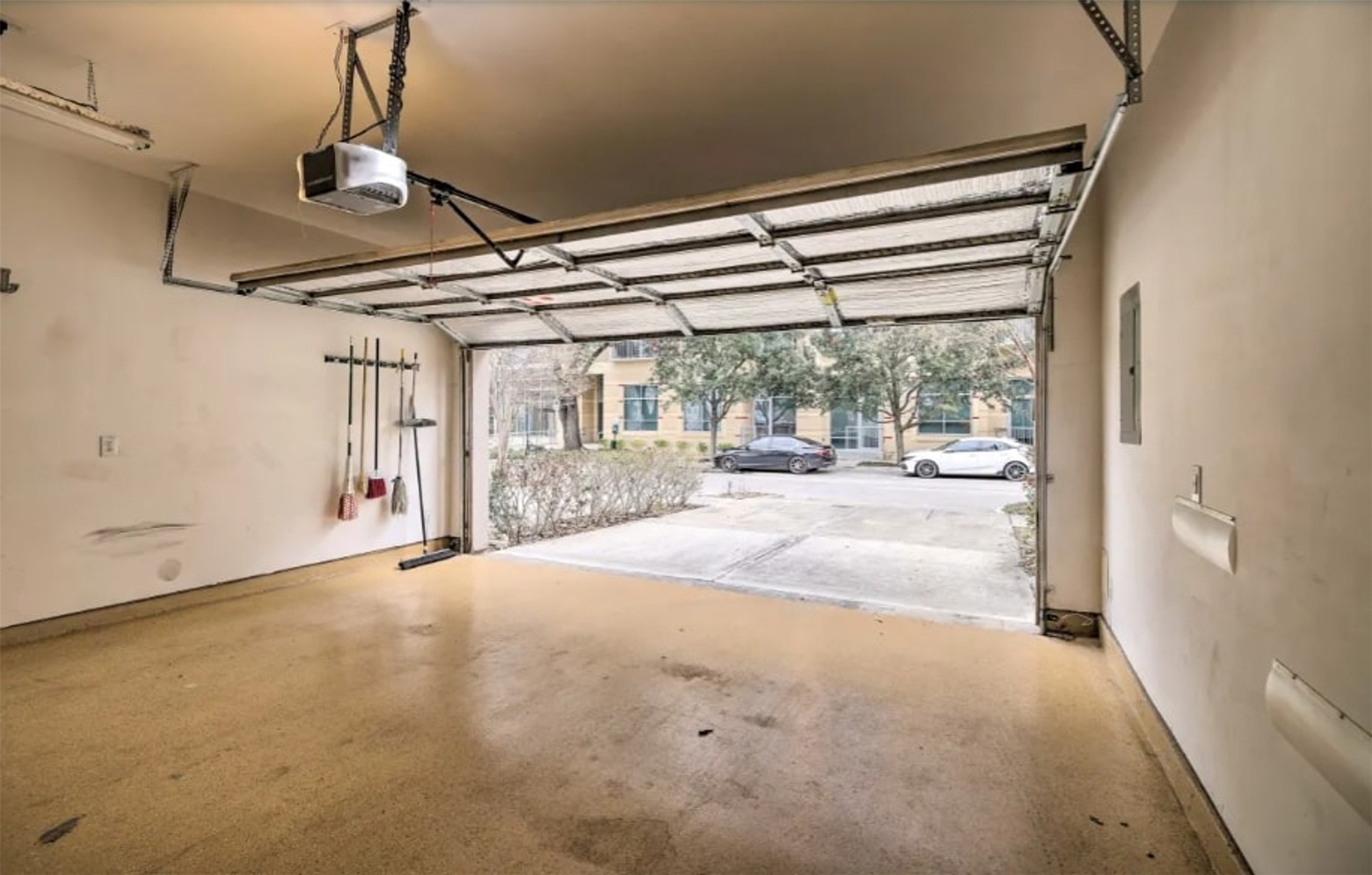 1006 Rochow Street, Unit A Houston, TX 77019 - Photo 29 of 29 a view of a room with wooden floor and windows