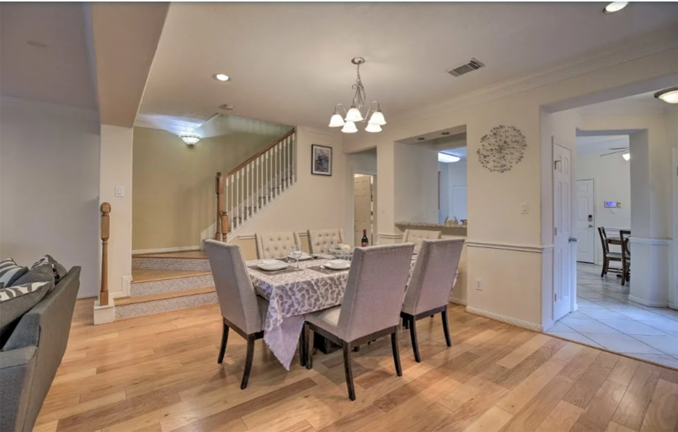 1006 Rochow Street, Unit A Houston, TX 77019 - Photo 5 of 29 a view of a dining room with furniture and wooden floor
