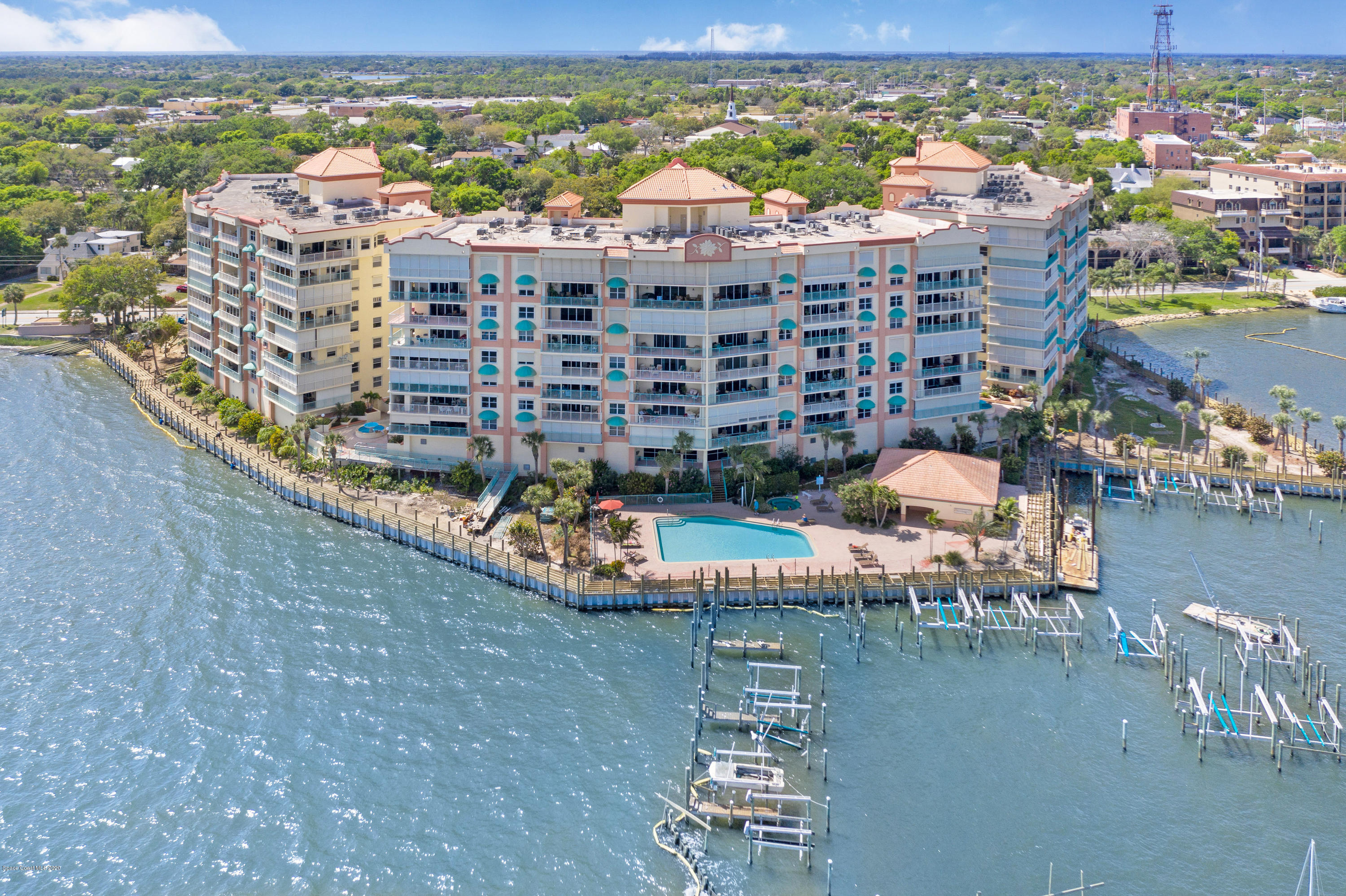 102 Riverside Drive, Unit 304 Cocoa, FL 32922 - Photo 1 of 49 a view of a city with tall buildings