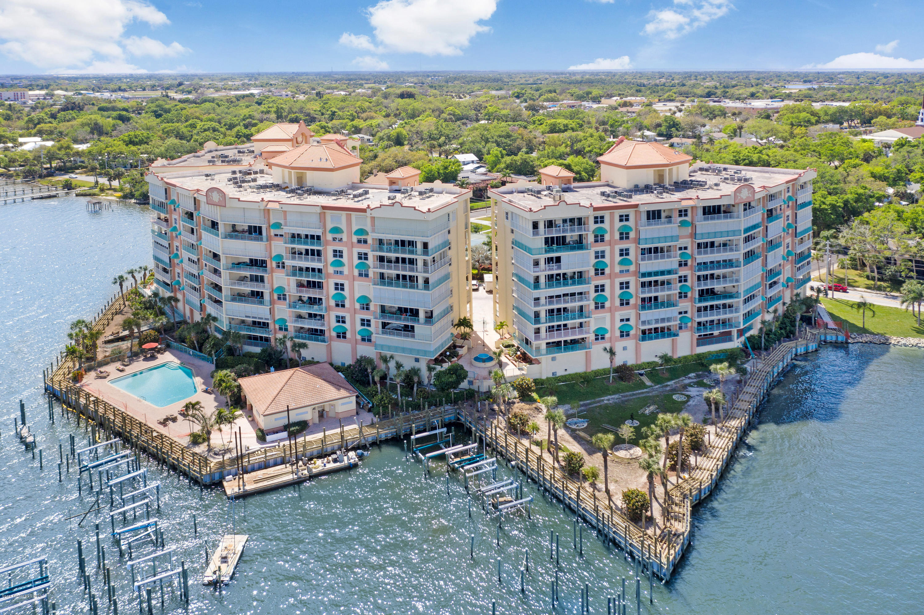 102 Riverside Drive, Unit 304 Cocoa, FL 32922 - Photo 2 of 49 a view of a city with tall buildings