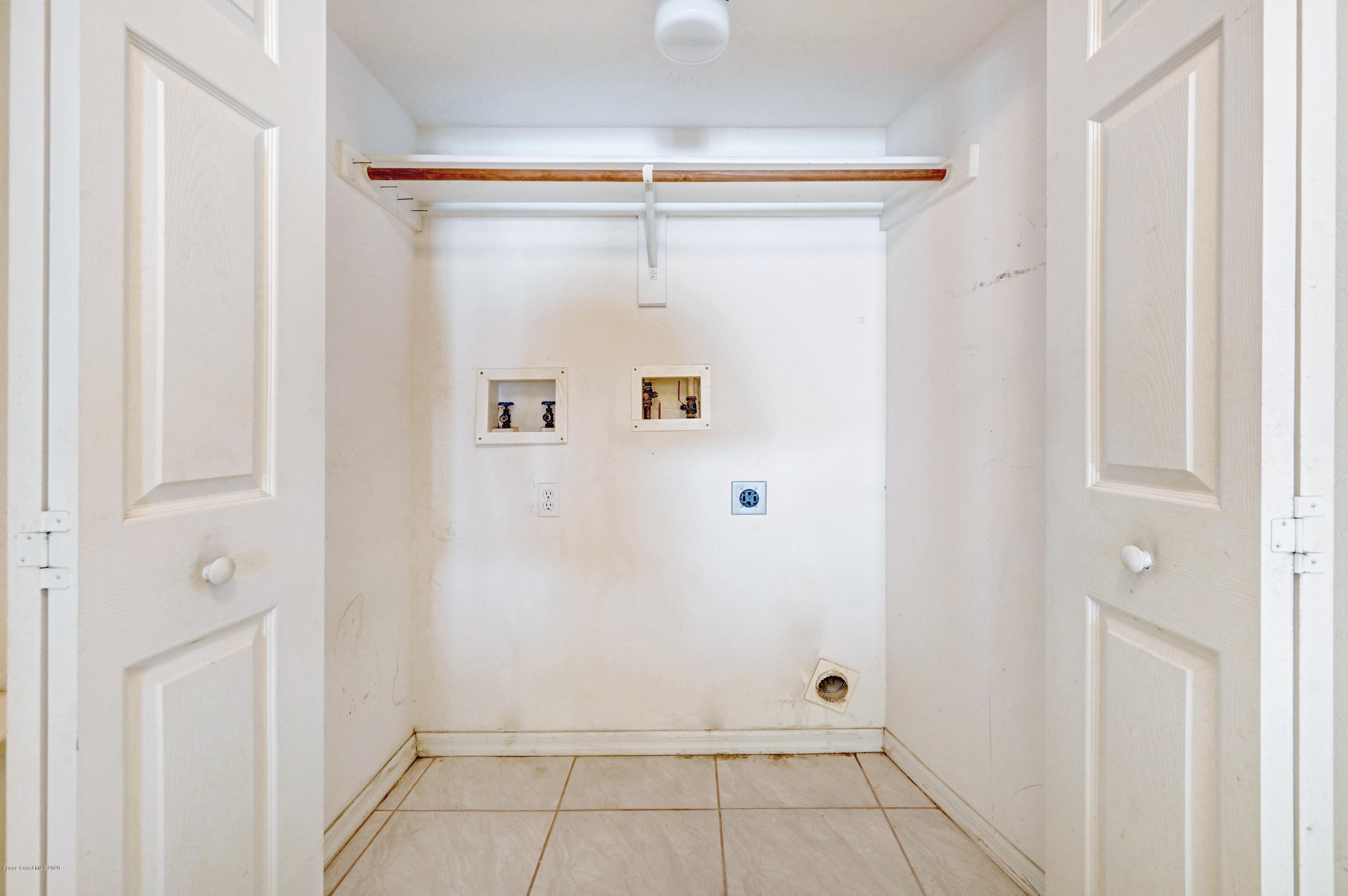 102 Riverside Drive, Unit 304 Cocoa, FL 32922 - Photo 23 of 49 a view of utility room