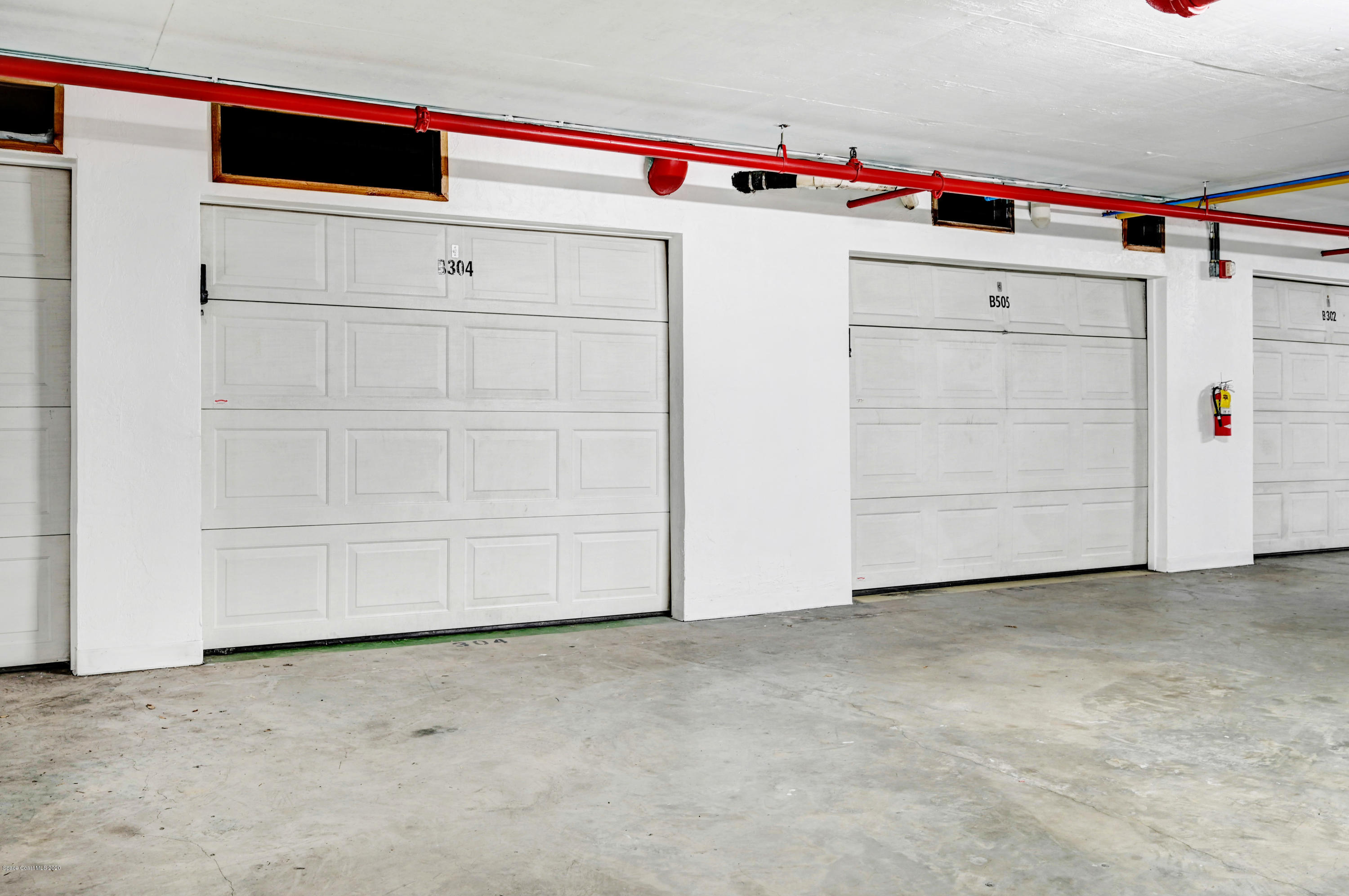 102 Riverside Drive, Unit 304 Cocoa, FL 32922 - Photo 26 of 49 a utility room with dryer and washer