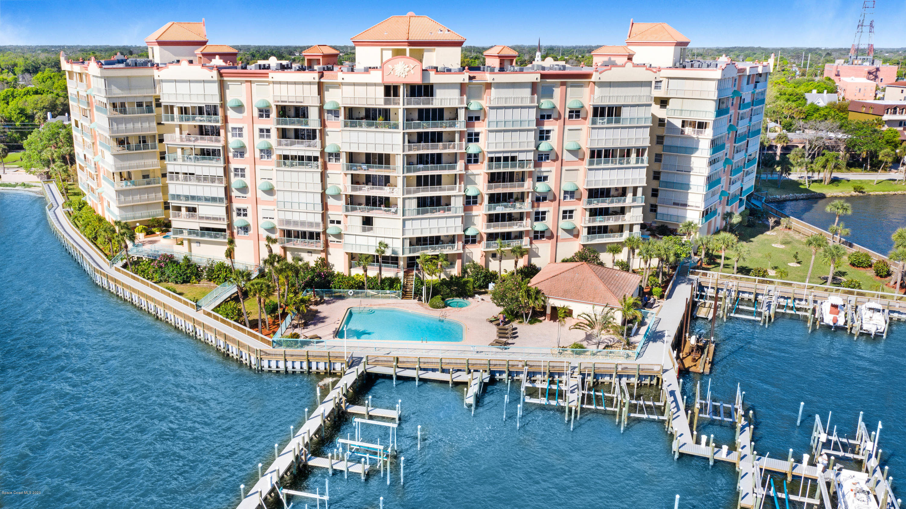 102 Riverside Drive, Unit 304 Cocoa, FL 32922 - Photo 38 of 49 a view of building with outdoor seating space