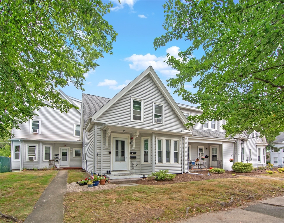 a front view of a house with a porch