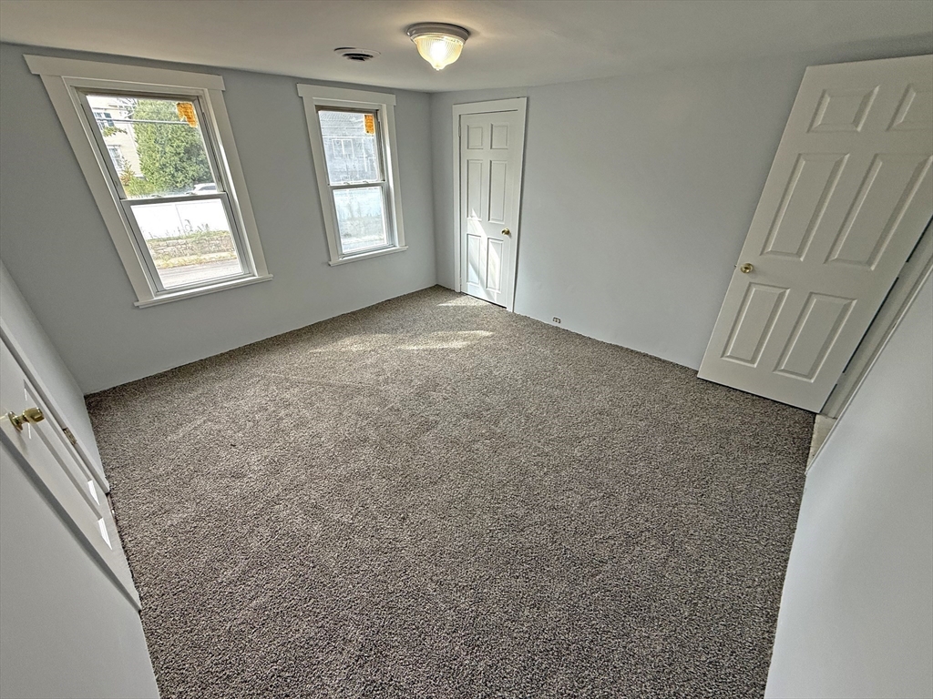 135-137 Temple Street Whitman, MA 02382 - Photo 14 of 15 an empty room with windows