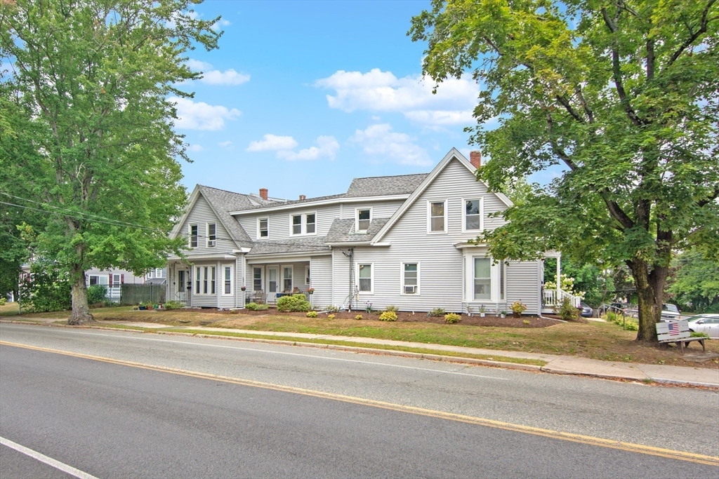 135-137 Temple Street Whitman, MA 02382 - Photo 4 of 15 a view of city with tall buildings