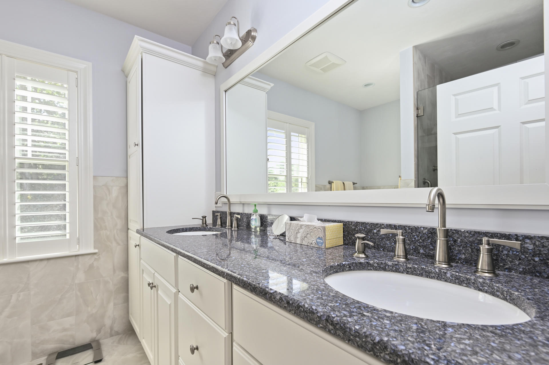 24 Pasture Road Cataumet, MA 02534 - Photo 11 of 24 a bathroom with double vanity sinks and a mirror