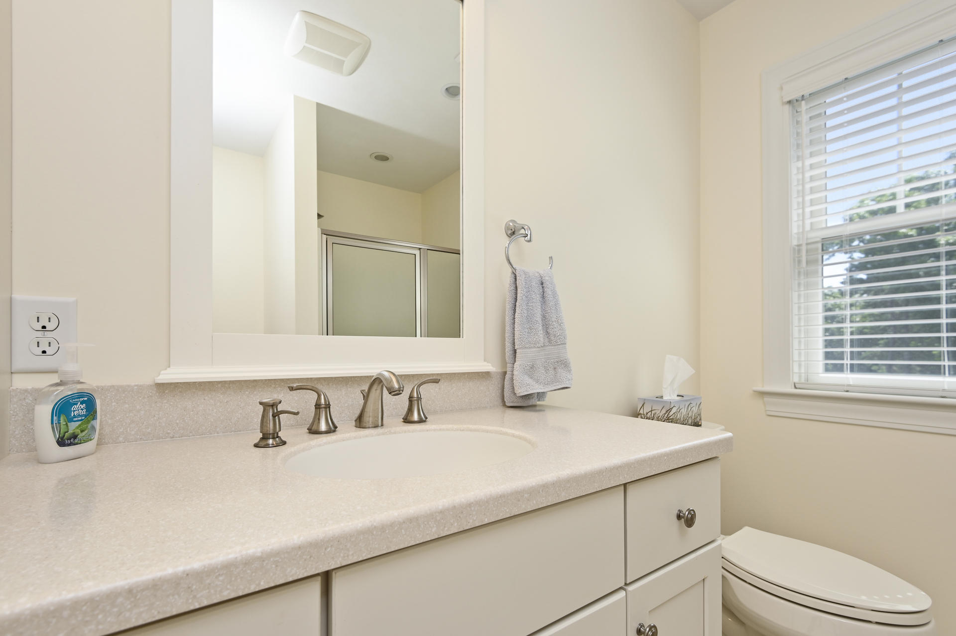 24 Pasture Road Cataumet, MA 02534 - Photo 17 of 24 a bathroom with a sink and a mirror