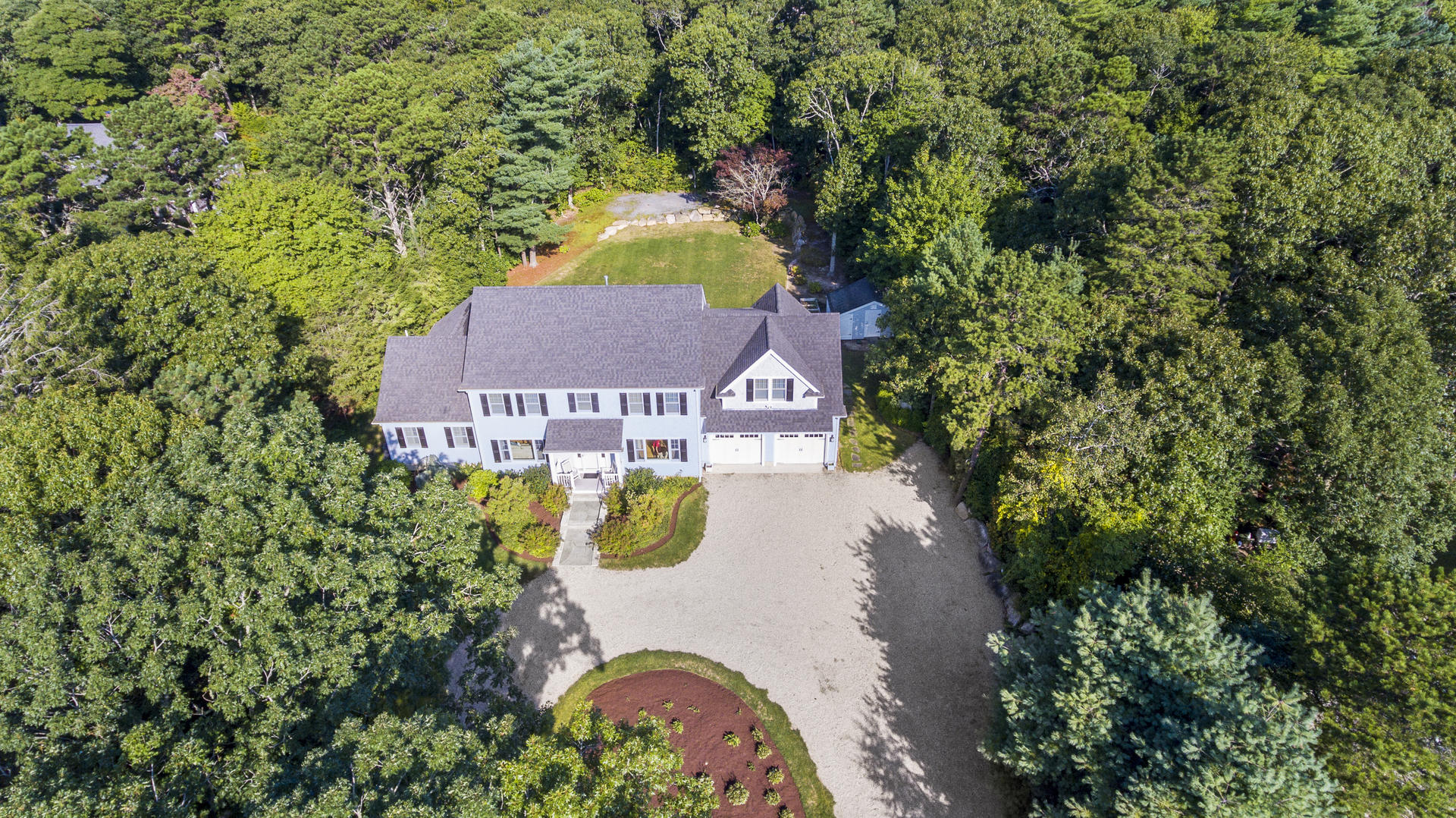24 Pasture Road Cataumet, MA 02534 - Photo 21 of 24 an aerial view of a house with a garden