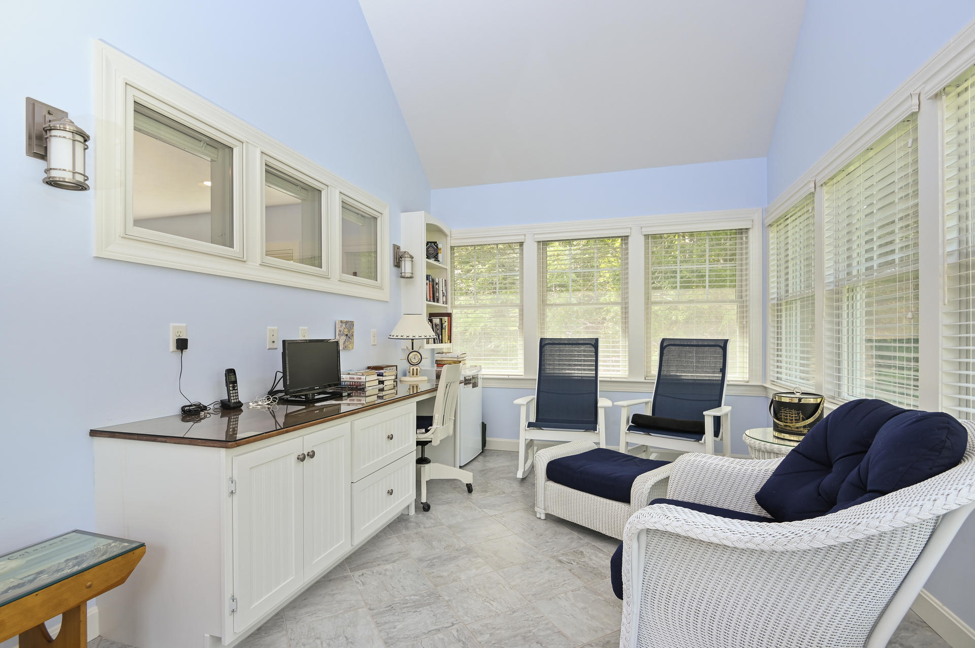 24 Pasture Road Cataumet, MA 02534 - Photo 9 of 24 a living room with furniture a flat screen tv and a large window