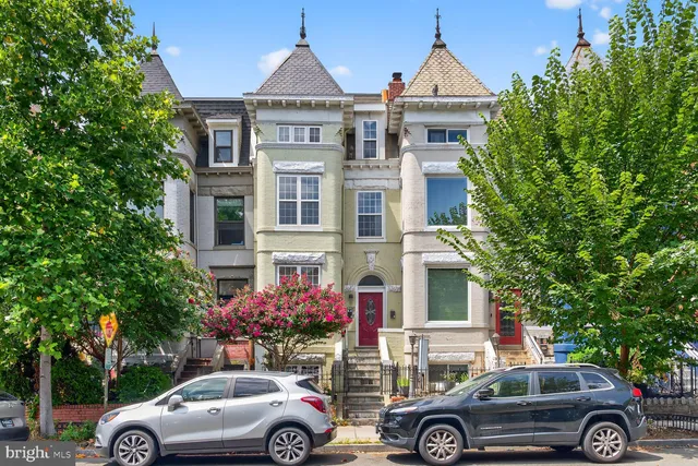 a front view of a house with parking