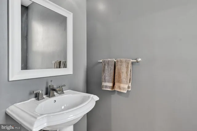 a view of hallway with wooden floor
