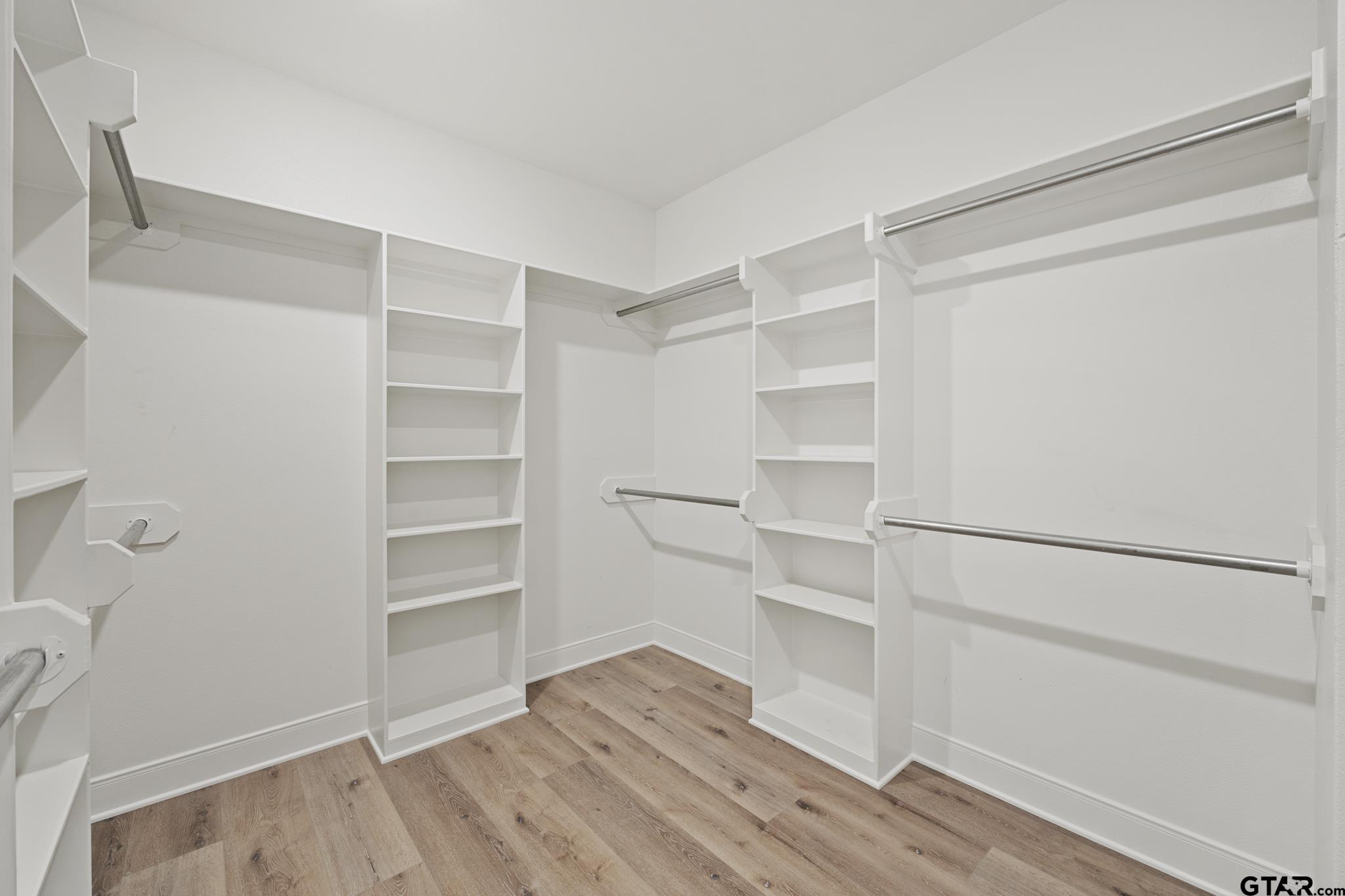 18778-c R 1100 C R 1100 Flint, TX 75762 - Photo 26 of 43 a view of walk in closet with empty racks