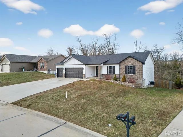 $335,000 | 405 Sandra Drive, Truesdale, MO 63380