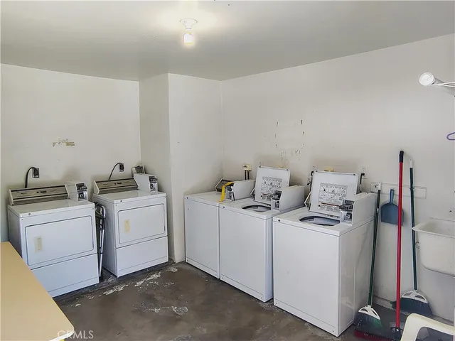 a view of a garden with a house