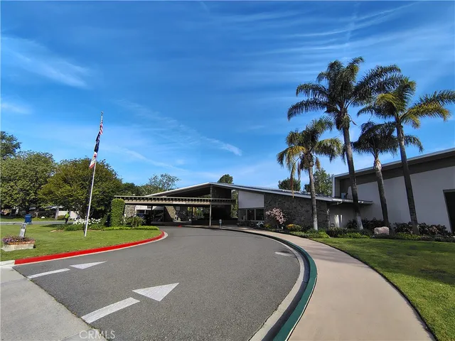 a view of a hallway with cabinet