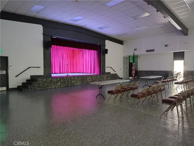 a view of a room with lots of wooden floor