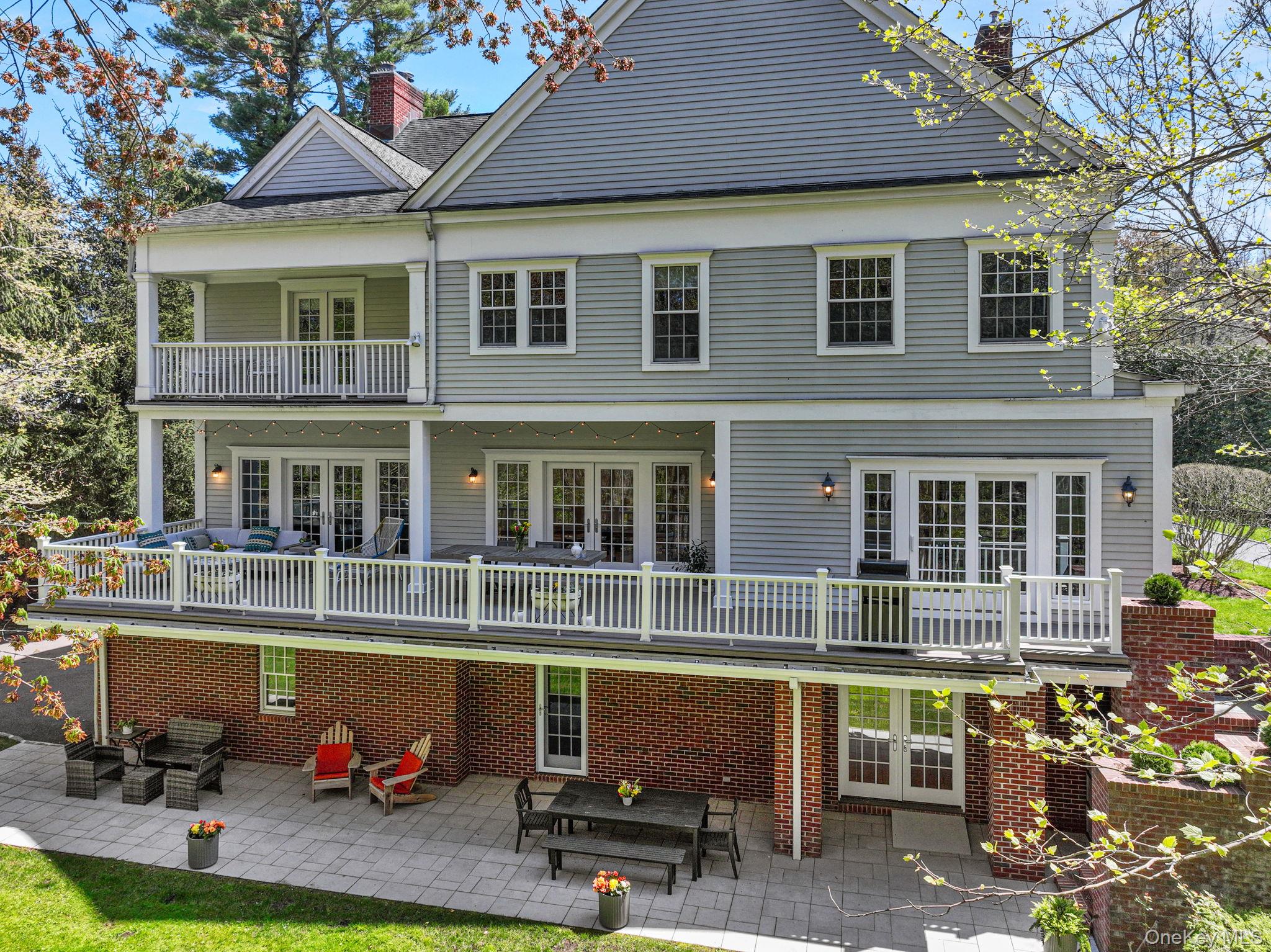 10 Morris Court Rye, NY 10580 - Photo 38 of 44 Enjoy unmatched backyard privacy, with park-like views from your deck, patio and primary bedroom balcony.