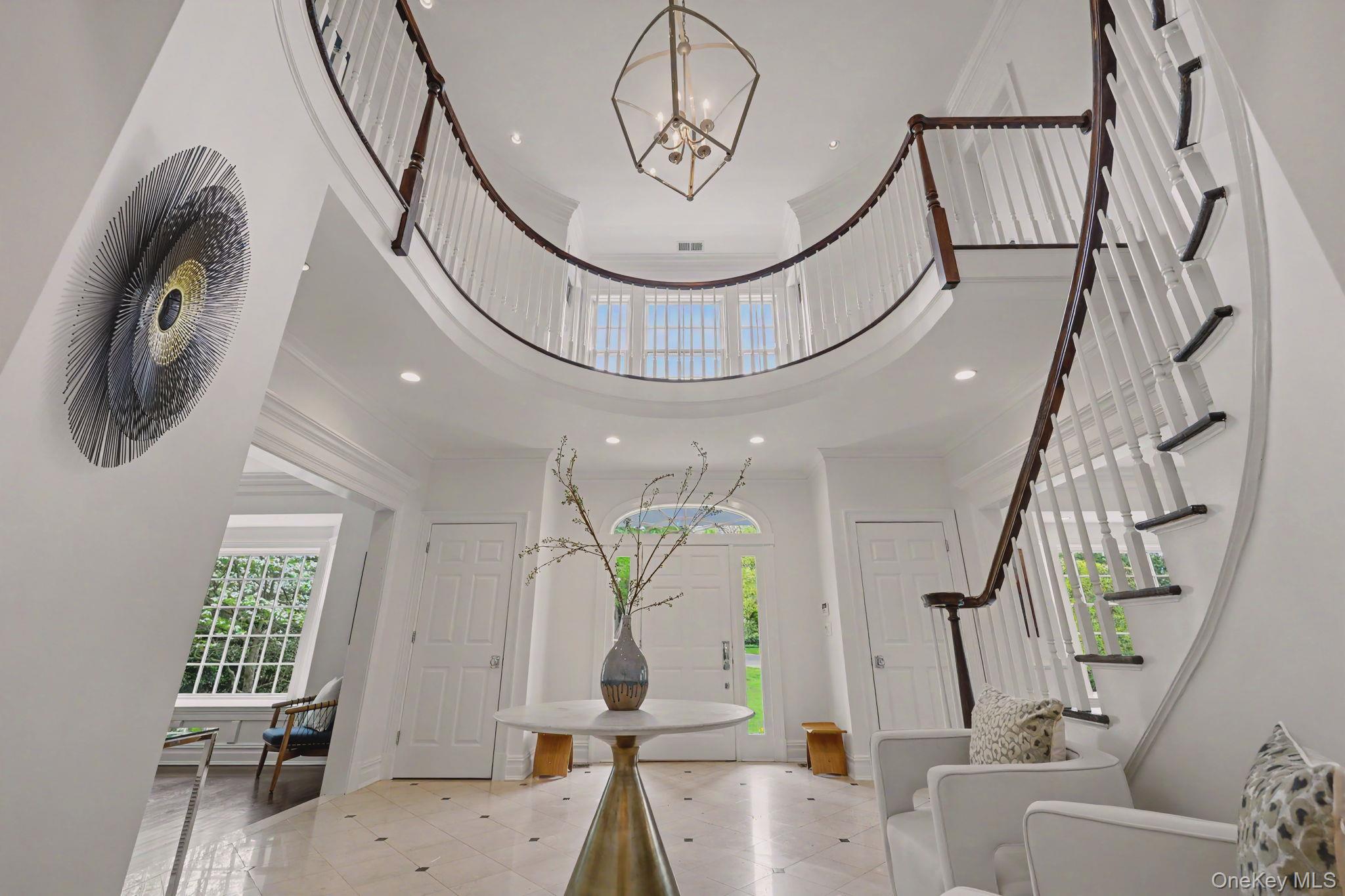 10 Morris Court Rye, NY 10580 - Photo 4 of 44 Marble entry foyer with front spiral staircase