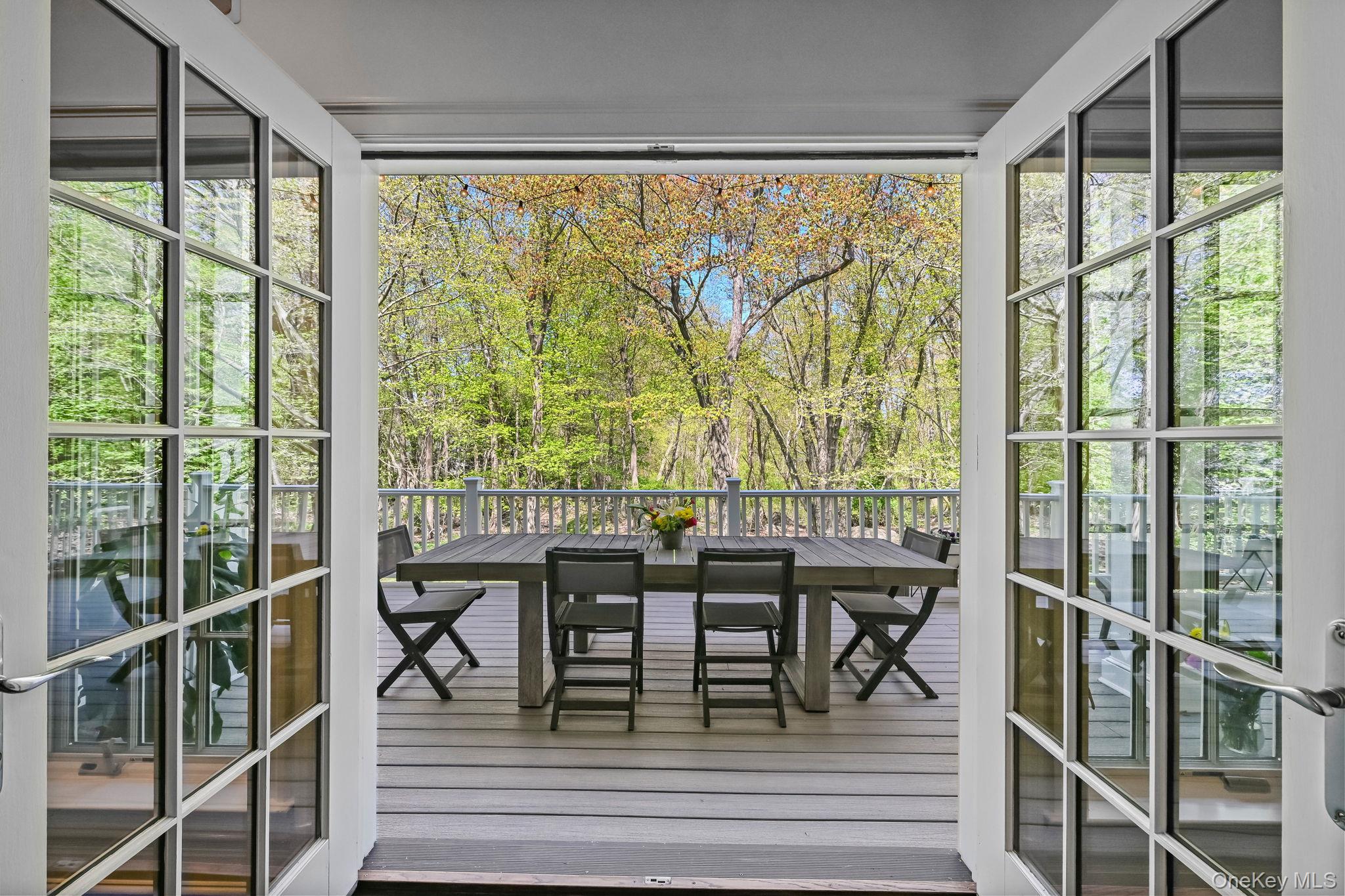 10 Morris Court Rye, NY 10580 - Photo 9 of 44 Family room opens to deck through French doors