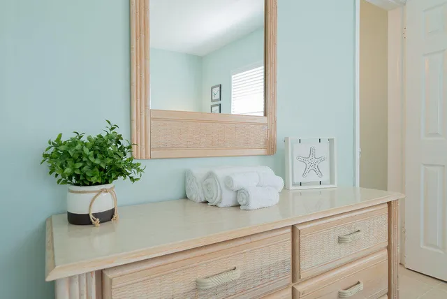 a bedroom with a bed and a view of bathroom