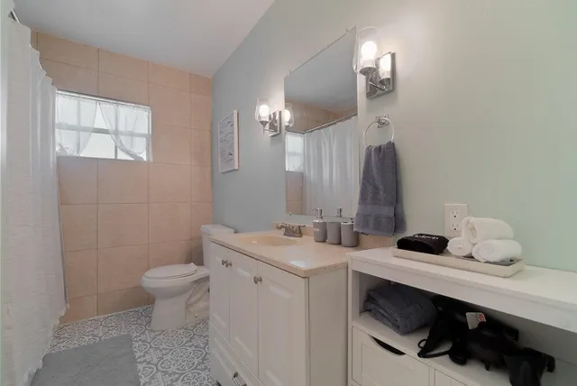 a close view of shoes stand and cabinets