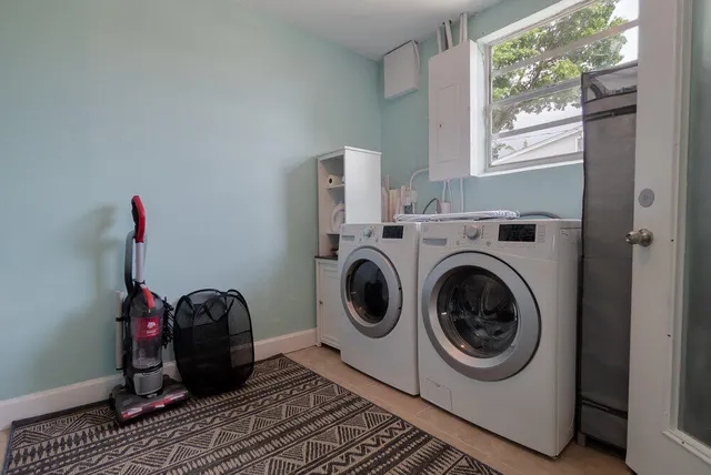 a kitchen that has a stove and a sink