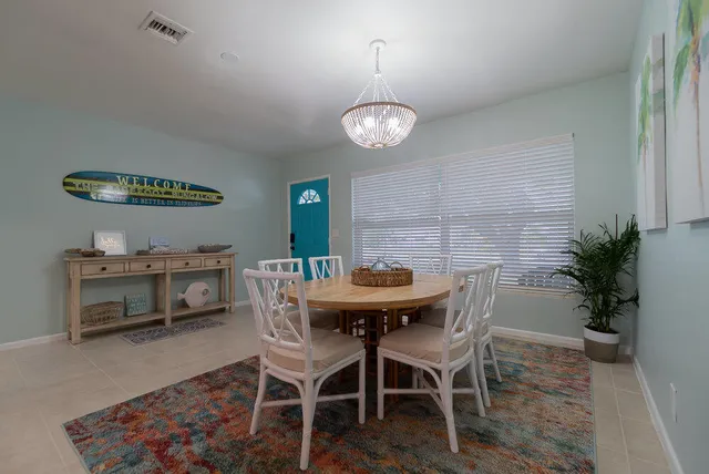 a view of a dining room with furniture