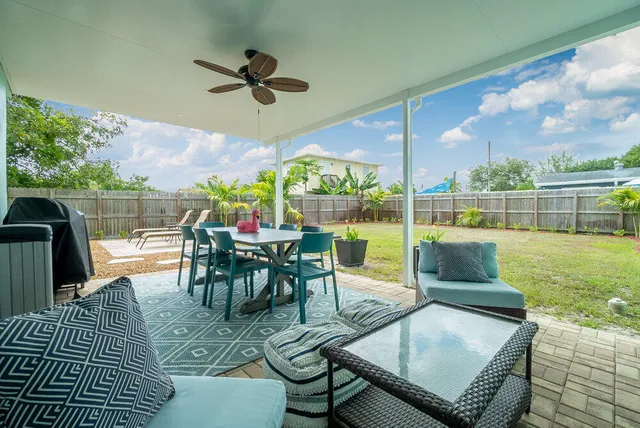 a view of a livingroom with furniture and windows