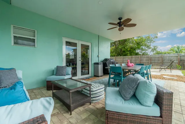 a view of yard with swimming pool and chair